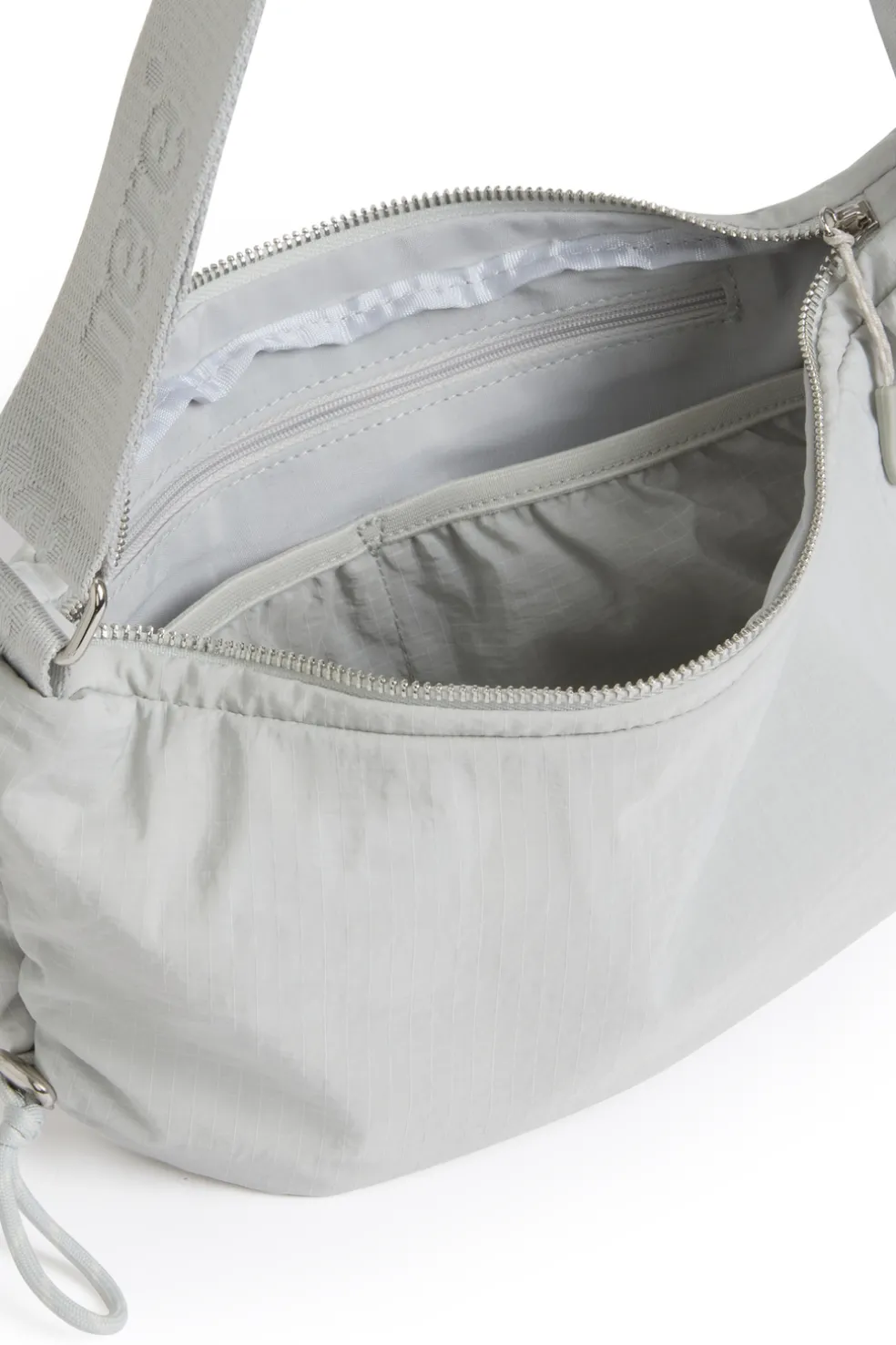 n.motion Crescent Sling Bag