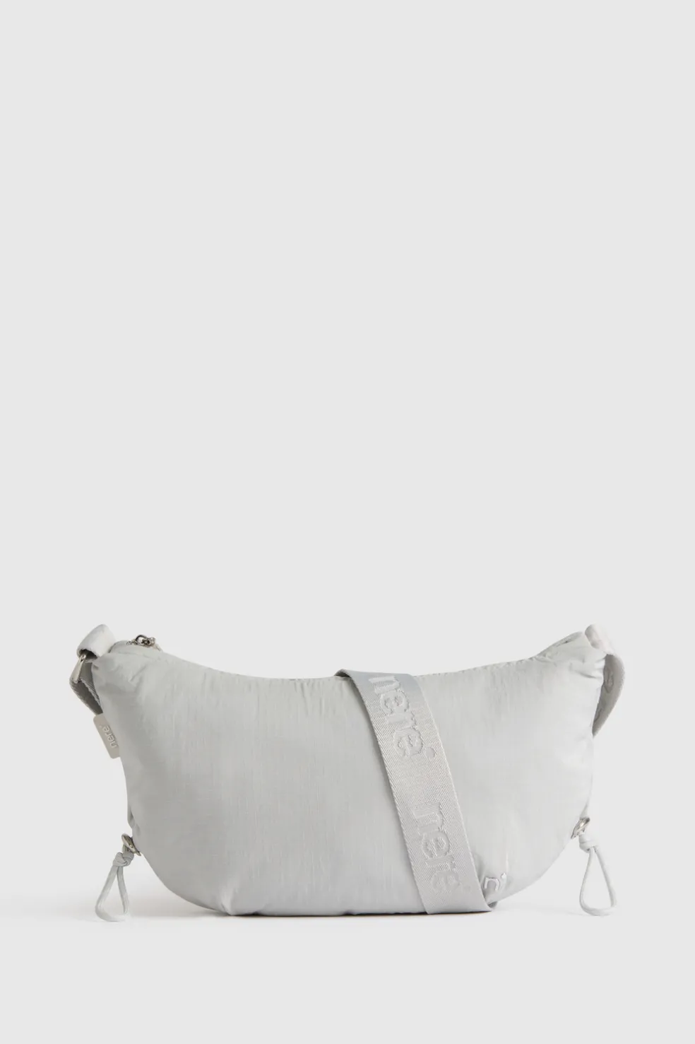n.motion Crescent Sling Bag