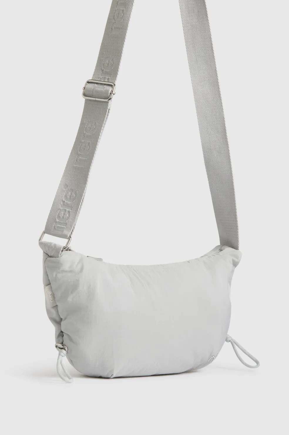 n.motion Crescent Sling Bag